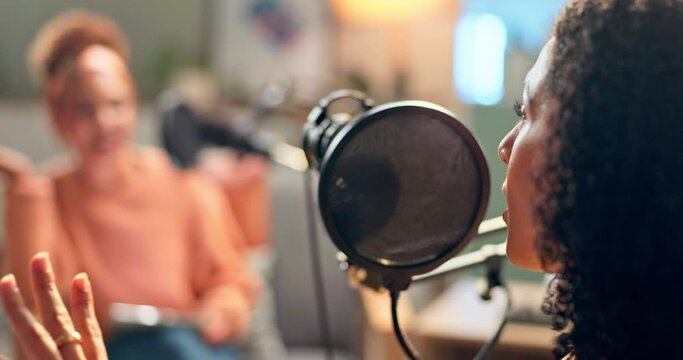 Interview, microphone and women in living room for social media, discussion or pov live streaming talk show. Podcast, content creation or people in studio hosting current events, news or broadcast