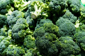 Gordijnen Pile of fresh broccoli in market © xy