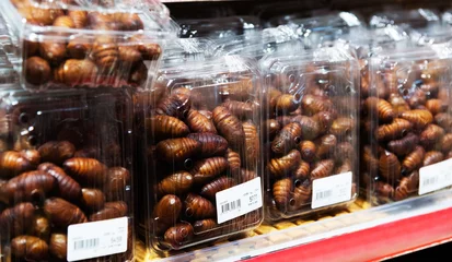 Gordijnen Silkworm pupae on the supermarket shelf © xy