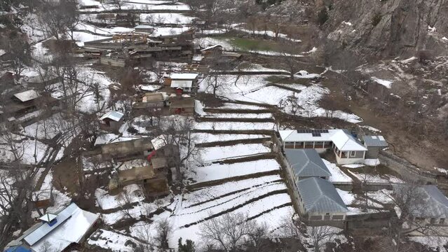 Agricultural Terraces in Kalash at Winter. Khyber Pakhtunkhwa, Pakistan. Aerial View Remote Muntain Villages Himalayas.
