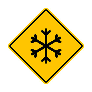 Snowfall sign. Snowfall warning sign. Yellow diamond road sign with a snowflake icon inside. Be careful, snowfall, slippery road. Rhomb road sign. Snow and ice sign.