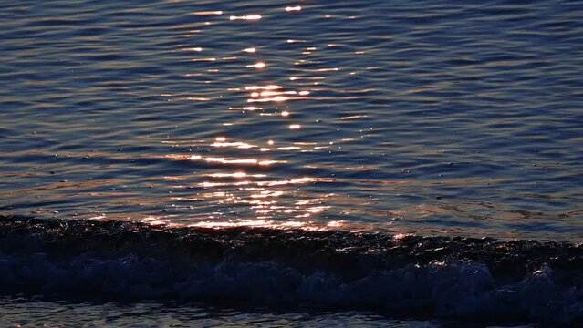 Ripples in the sea at sunrise