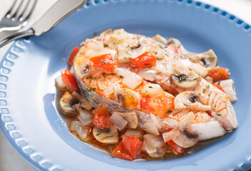 salmon with champignons and vegetables