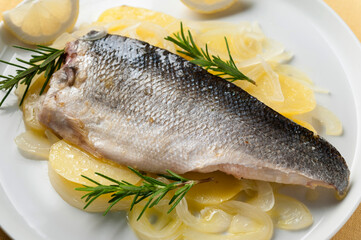 sea bass with potatoes and onion