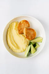 Outdoor kussens mashed potato with cutlets and cucumber © Maksim Shebeko