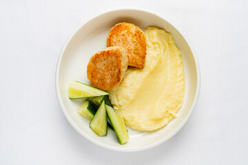 mashed potato with cutlets and cucumber - 787081237