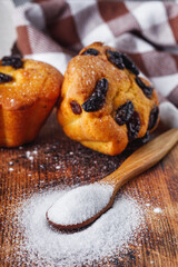 muffins baked with the addition of ammonium carbonate on a wooden rustic background