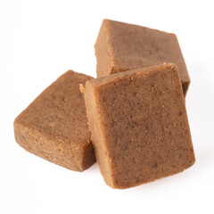 vegetable broth cube on a white background