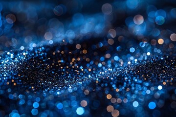 Sparkling and glittering blue bokeh lights creating an abstract and mesmerizing background