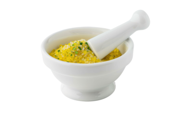 White porcelain mortar and pestle with yellow and green
isolated on white background