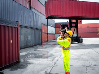 Portrait of a handsome engineer under inspection and checking production process on dock station...
