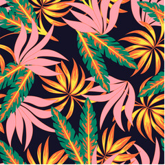 Abstract seamless tropical pattern with bright plants and leaves on a black background. Tropical botanical. Exotic jungle wallpaper.Colorful stylish floral. 