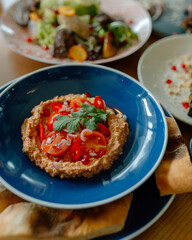 Eastern cuisine. Georgian fresh salad. Georgian national cuisine, food on the table in the...