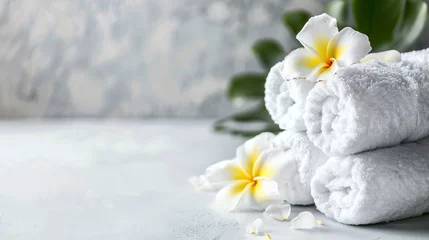 Foto auf Acrylglas Spa composition. Rolled towels and plumeria flowers  © Anas