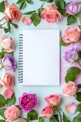 Spiral Notebook Surrounded by Pink and White Roses