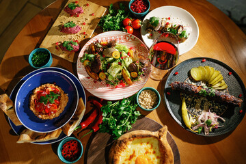 Eastern cuisine. Georgian fresh salad. Georgian national cuisine, food on the table in the...