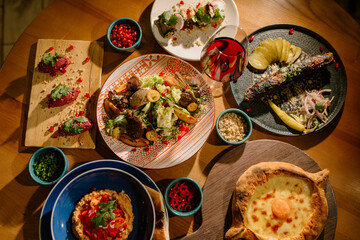 Eastern cuisine. Georgian fresh salad. Georgian national cuisine, food on the table in the...