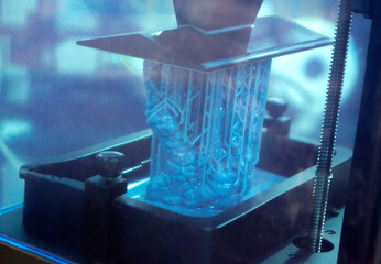 Process SLA 3D printing. Process printing on 3D printer by SLA printing technology. 3D printed...