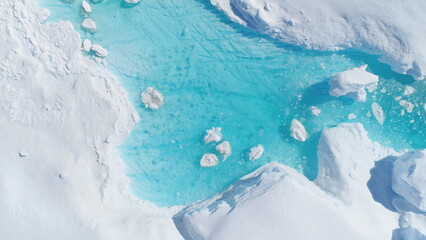 Antarcica Iceberg Turquoise River Top Down View. Nature Lake with Blue Water and Broken Ice Flow. Ecology, Melting Ice, Climate Change and Global Warming Concept Aerial Drone © mozgova
