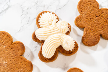 Creating Gingerbread Cookie Sandwiches with Buttercream Filling - 787122083