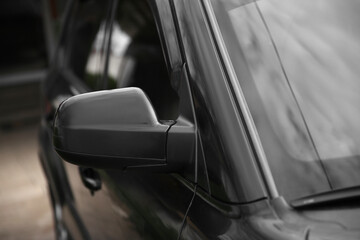 side mirror in car, black side mirror