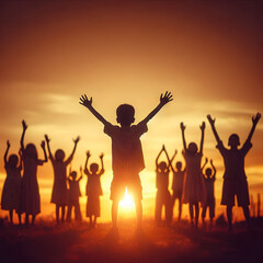 group of children playing at sunset