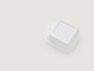 Food box container for delivery or takeout isolated on beige background