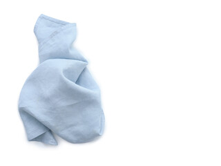Flat lay with blue linen kitchen napkin isolated on white background. Folded cloth for mockup