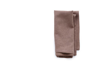 Overhead shot of a brown linen kitchen napkin isolated on white background. Folded cloth for mockup