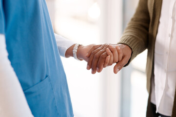 Empathy, holding hands and senior man with nurse in retirement home for support, care and healing....