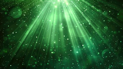 Abstract green sparkling light rays with bokeh.
