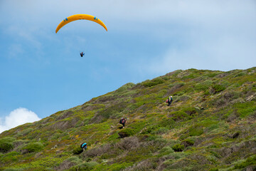 paraglider in the sky, Argentiera, Sassari, Sardinia, Italy