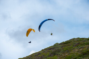 2 paraglider in the sky, Argentiera, Sassari, Sardinia, Italy
