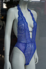 closeup of blue underwear on mannequin in a fashion store showroom