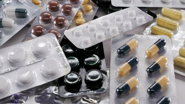Assorted Medication Pills in Blister Packs Close-Up