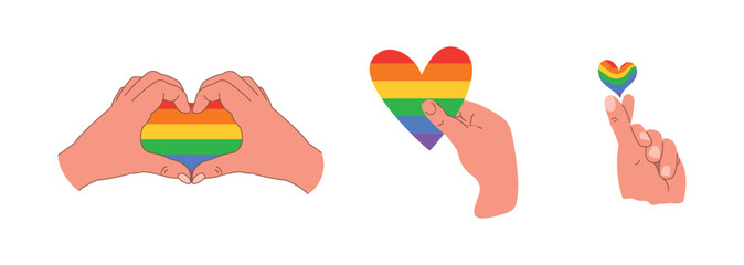 hand holding rainbow heart, symbol of lgbt, pride, isolated human hands