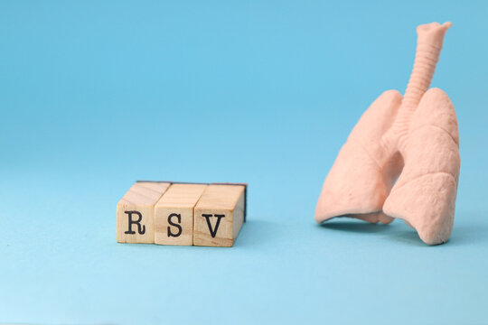 RSV (Respiratory Syncytial Virus) on blue background with a lung