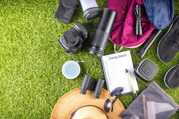 Camping checklist with various camp equipment. List of things for outdoors recreation and travel in nature - tent, first aid kit, cosmetics, accessories, equipment, clothes, trekking shoes - 787166808