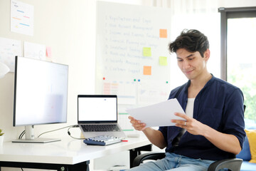 Man working with computer at home office, Working at home, Online learning education - 787166818
