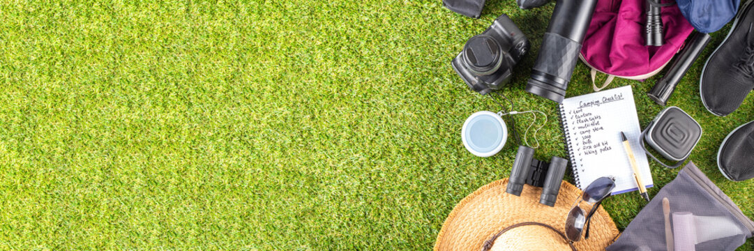 Camping checklist with various camp equipment. List of things for outdoors recreation and travel in nature - tent, first aid kit, cosmetics, accessories, equipment, clothes, trekking shoes