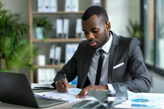 African American tax auditor conducting financial audit review