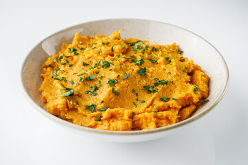 delicious sweet potato puree on a white background