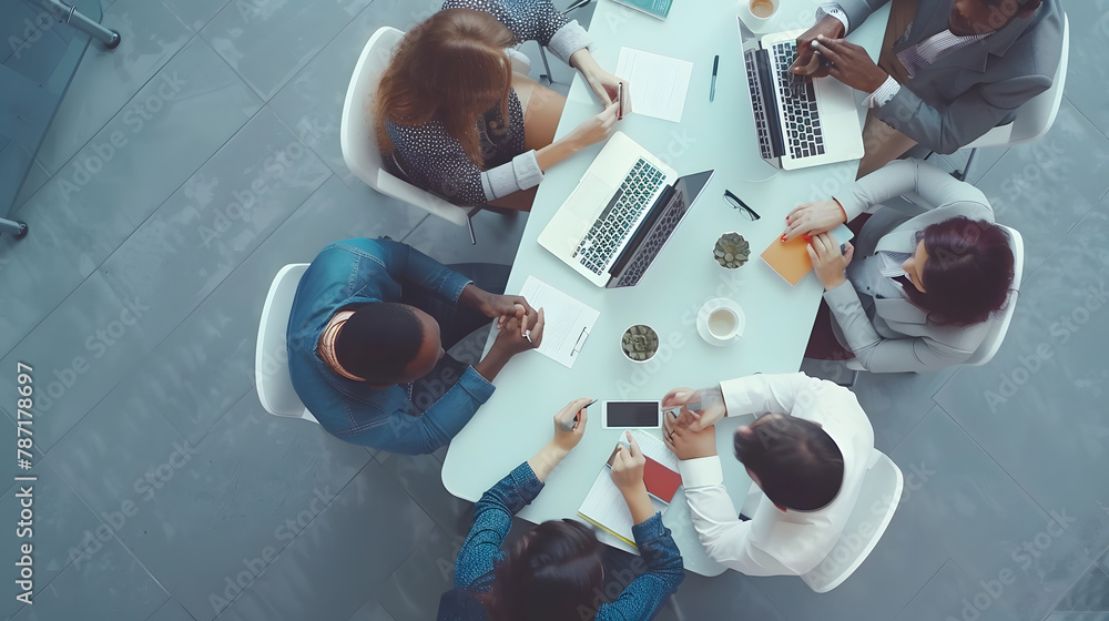 Leinwandbilder top view of group of multiethnic busy people working in an office aerial view with businessman and b