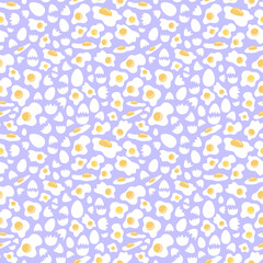 Fried eggs and cracked shells arranged on violet backdrop in seamless pattern. Complementary colored breakfast surface art for printing on various materials or use in graphic design projects.