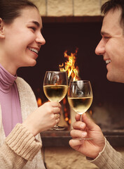 Portrait of a romantic couple toasting wineglasses