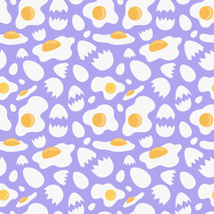 White eggs, broken shells and sunny side up fried eggs on violet background arranged in seamless pattern. Vibrant surface art for printing on different materials or use in graphic design.