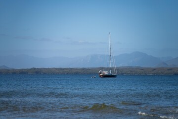 sailing on a yacht in the australian in the remote forest wilderness in spring