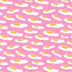 Side view of sunny side up fried eggs with bright yellow yolks on pink backdrop. Pink breakfast seamless pattern for printing on different materials or use in graphic design projects.