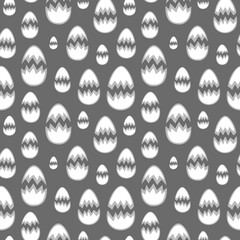 Small to large cracked eggshells on gray backdrop arranged in seamless pattern. Subtle monochrome surface art for printing on different materials or use in graphic design projects.