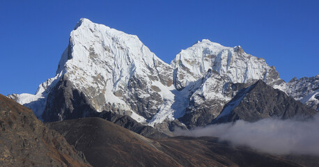 Snow covered mountains Cholatse and Tobuch, view from the Gokyo Valley, Nepal.